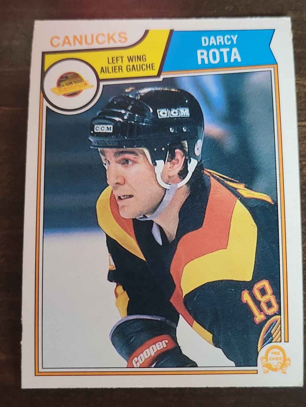 1983/84 OPC Darcy Rota Vancouver Canucks Hockey Card - Black, Yellow & Orange
